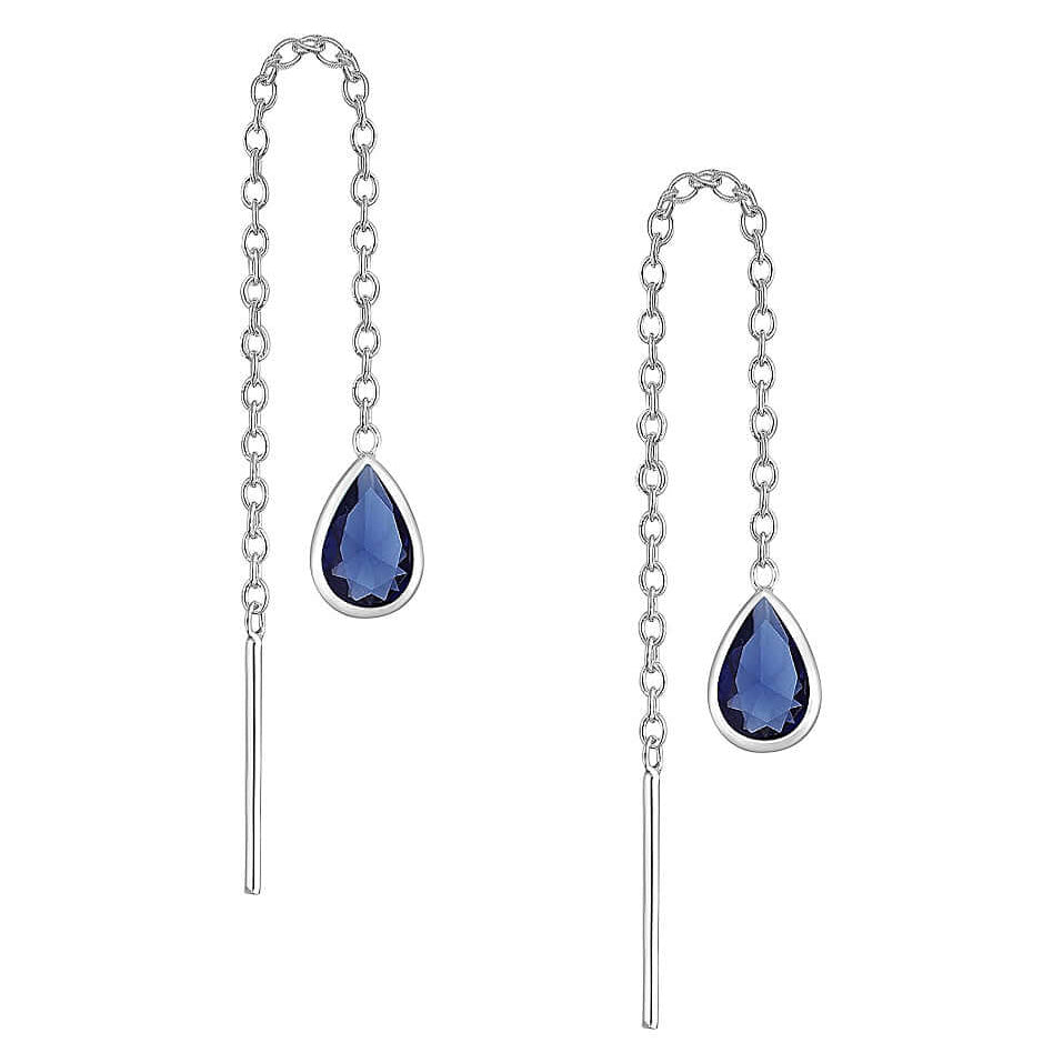A pair of sterling silver threader earrings with a blue crystal drop design.