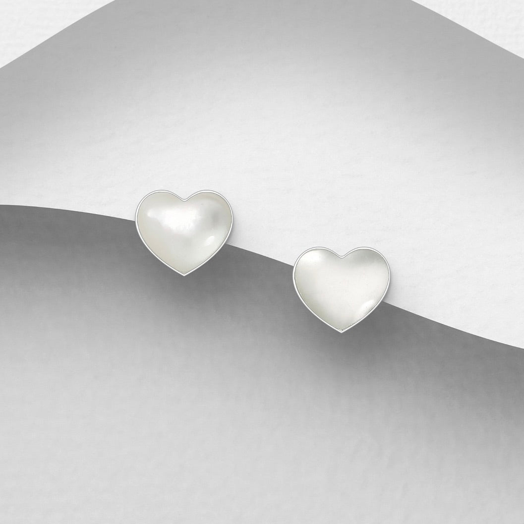 Heart-shaped Stud earrings in MOP on a silver background