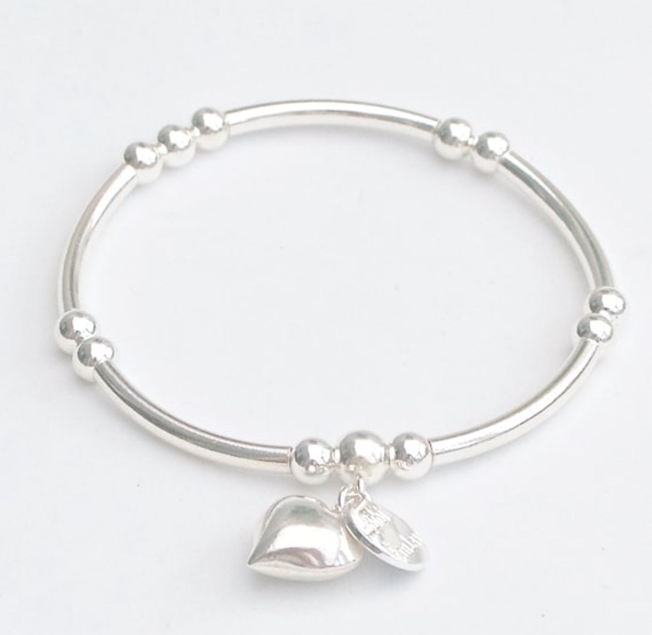 Sterling Silver noodle bead bracelet.  3mm x 38mm silver noodle beads, 4/5mm round silver beads.
