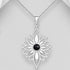 Silver necklace with a floral pendant featuring a black gemstone on a silver background
