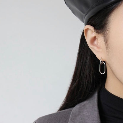 Oval drop huggie hoop earring in silver or gold