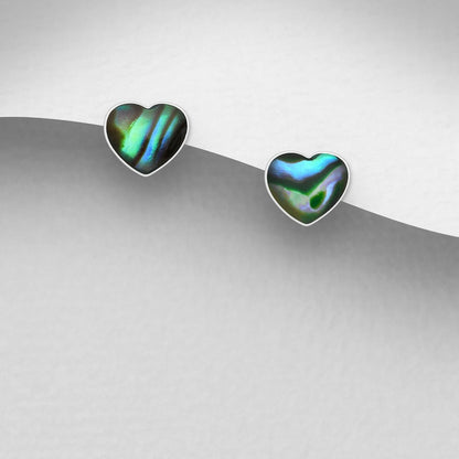 Heart-shaped earrings with a colourful gemstone on a silver background