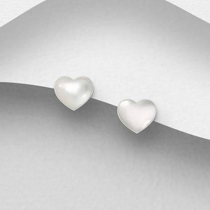 Heart-shaped Stud earrings in MOP on a silver background